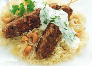 Spicy Lamb And Cashew Kebabs On Rice Pilaf