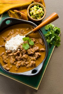 Beef rendang with fresh cucumber relish