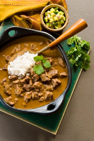 Beef rendang with fresh cucumber relish