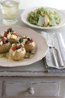 Pizza crumble-topped baked potatoes