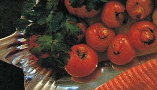 Pesto-stuffed baked tomatoes