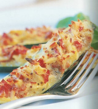 Pasta, ham and cheese-stuffed courgettes