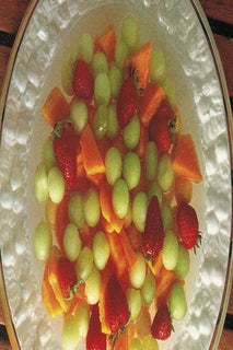 Sweet wine fruit salad with almond cream