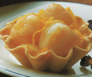 Creamed tartlets with citrus lychees