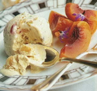 Pistachio nut ice cream with poached summer fruits
