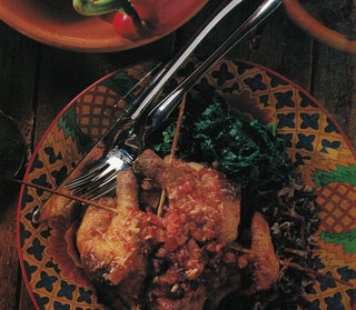 Seared poussins with roasted garlic and sundried tomatoes