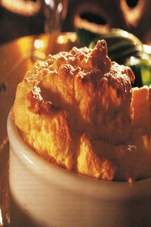 Grilled goat's cheese souffle with crispy bacon and apples
