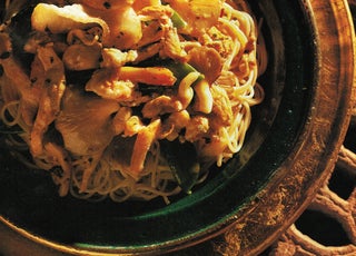Prawn and chicken in thyme chilli broth on pasta
