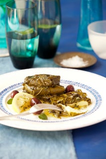 Grilled halloumi in vine leaves