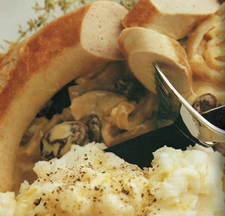 White veal sausages with thyme and raisins