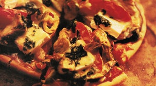 Aubergine and feta pizza with basil oil