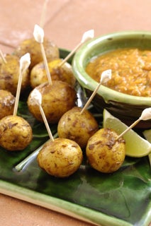 Indian spiked potato kebabs with tomato and lime dip