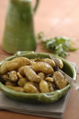 Potatoes roasted in a clay pot with tarragon