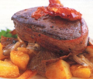 Venison steaks with wild mushrooms