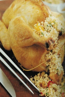 Roast Chicken With Fresh Date And Couscous Stuffing