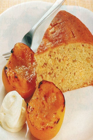 Citrus sour cream cake with roasted peaches.