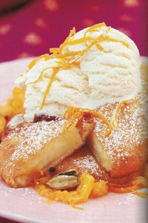 Pineapple Fritters With Boozy Cardamom And Orange Sauce